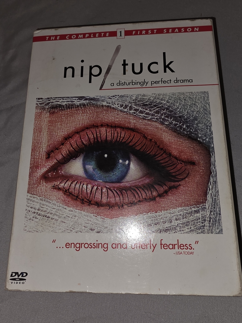 nip/tuck: The Complete First Season DVD - White